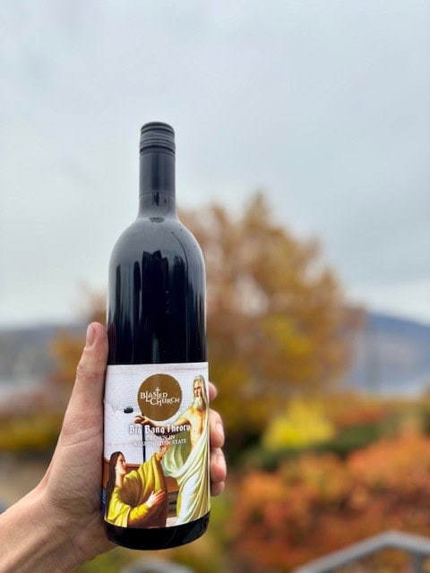 Blasted Church Big Bang Theory 2024 displayed at the property with fall colours in the background